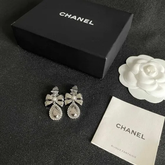 Chanel CC Bow Teardrop Crystal Pearl Drop Earrings earrings Silver-toned metal with white faux pearl and clear crystal accents Approximately 3 5cm drop length