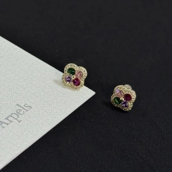 Van Cleef Arpels Alhambra earrings yellow gold metal with white diamond pave green pink purple and ruby red gemstones 8mm stud diameter