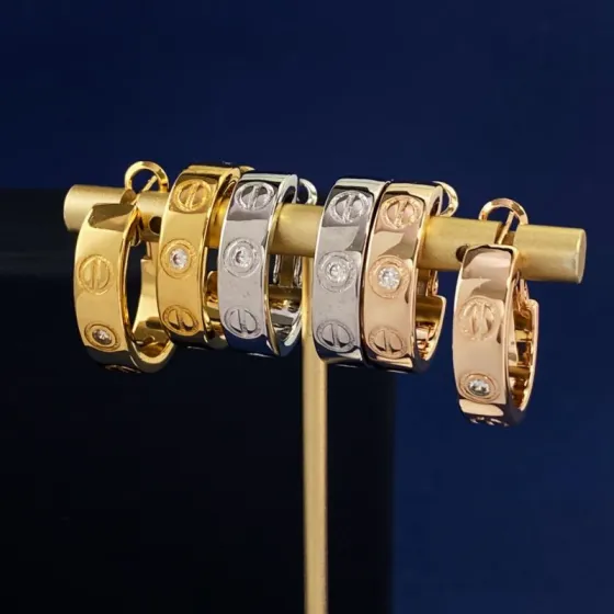 Cartier LOVE earrings 18K yellow gold 18K white gold 18K rose gold with clear diamond accents 13mm hoop diameter