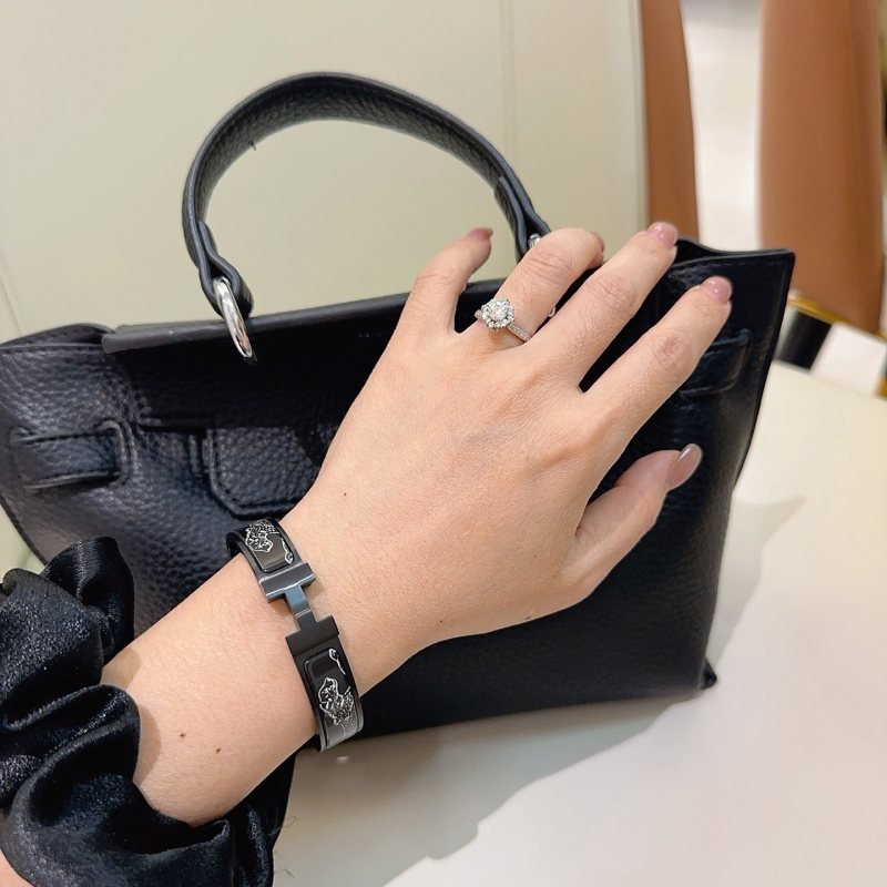 Hermes Clic Clac H Cheval Deco bracelet black enamel with silver-tone metal hardware silver equine decorative detailing 17