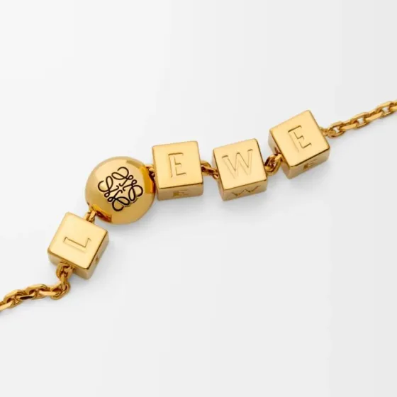 Loewe Anagram Dice Letter bracelet Gold-tone metal with black enamel Anagram logo no gemstones 17cm with 3cm extender