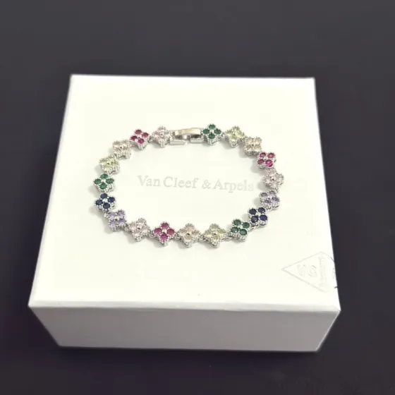 Van Cleef Arpels Alhambra bracelet Silver-toned metal with multicolor gemstones fuchsia pink light pink champagne pale yellow green navy blue lavender purple 18cm