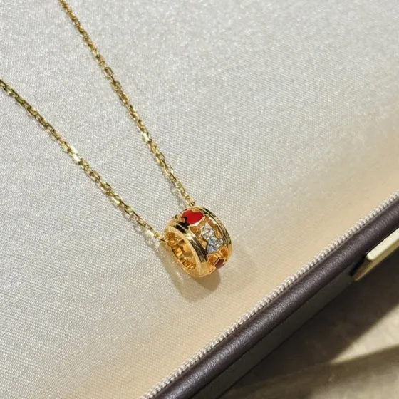 Qeelin Wulu necklace Yellow gold plated metal with red agate and clear diamond accents 40-45cm adjustable