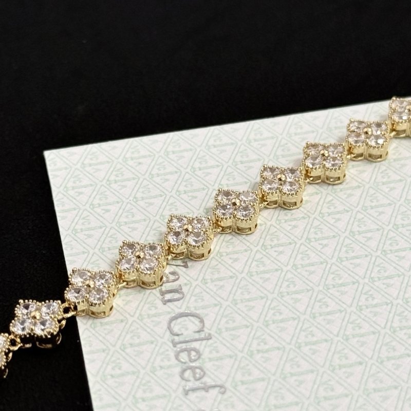 Van Cleef Arpels Alhambra bracelet yellow gold with clear faceted gemstones 18cm