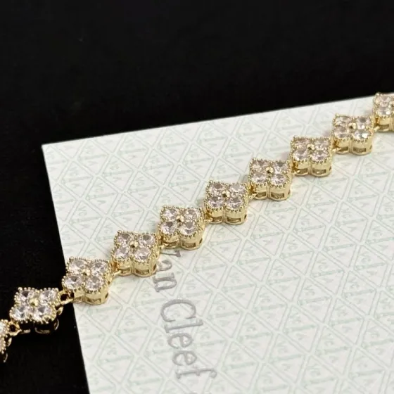 Van Cleef Arpels Alhambra bracelet yellow gold with clear faceted gemstones 18cm