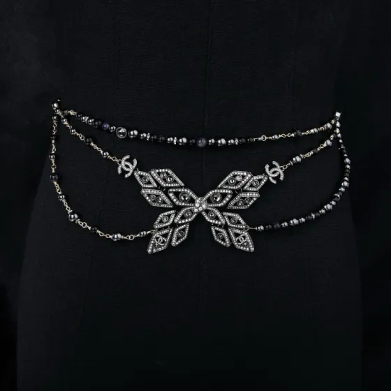 Chanel CC Snowflake Multi-Strand Beaded Chain necklace Gold-tone and gunmetal-tone metal with black beads and clear crystal accents 80cm