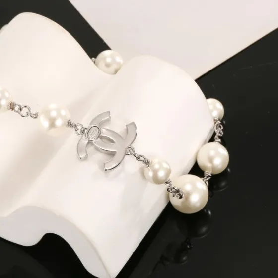 Chanel CC Logo Graduated Pearl Long Necklace necklace Silver-toned metal cream white faux pearls clear crystal accents 80cm