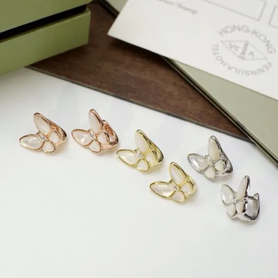 Van Cleef Arpels Two Butterfly earrings Rose gold yellow gold silver-toned white gold with white mother-of-pearl and clear diamond accents 12mm