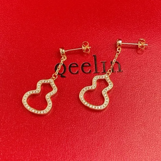 Qeelin Wulu earrings 18k rose gold with clear diamond accents 3cm drop length