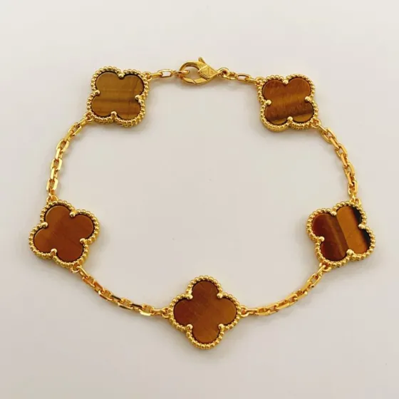 Van Cleef Arpels Alhambra Vintage 5 Motifs bracelet Yellow gold with brown tiger s eye stone 18cm
