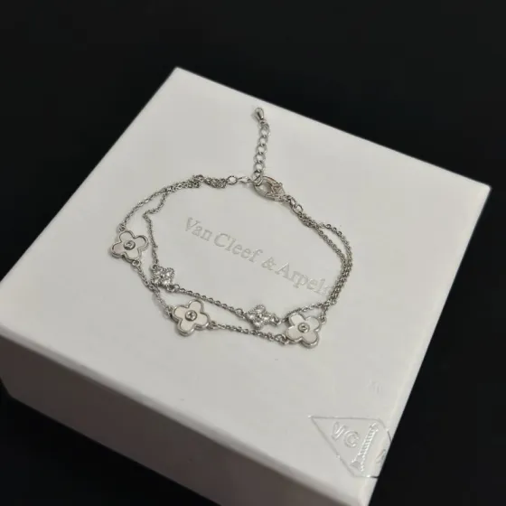 Van Cleef Arpels Alhambra bracelet silver-toned metal white mother-of-pearl clear diamond accents 17cm with 3cm extender