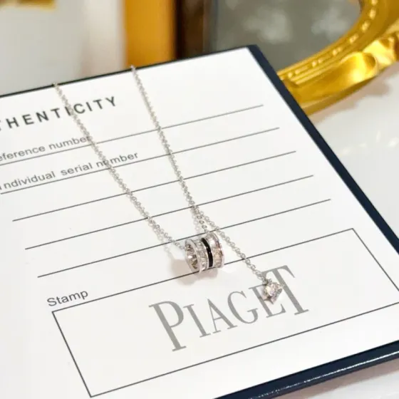 Piaget Possession necklace Silver-toned metal with clear diamonds and black enamel accent 42cm