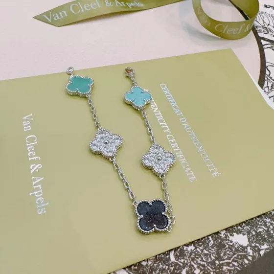 Van Cleef Arpels Alhambra bracelet Silver-toned metal with turquoise diamond-paved and black glittering clover motifs 19cm