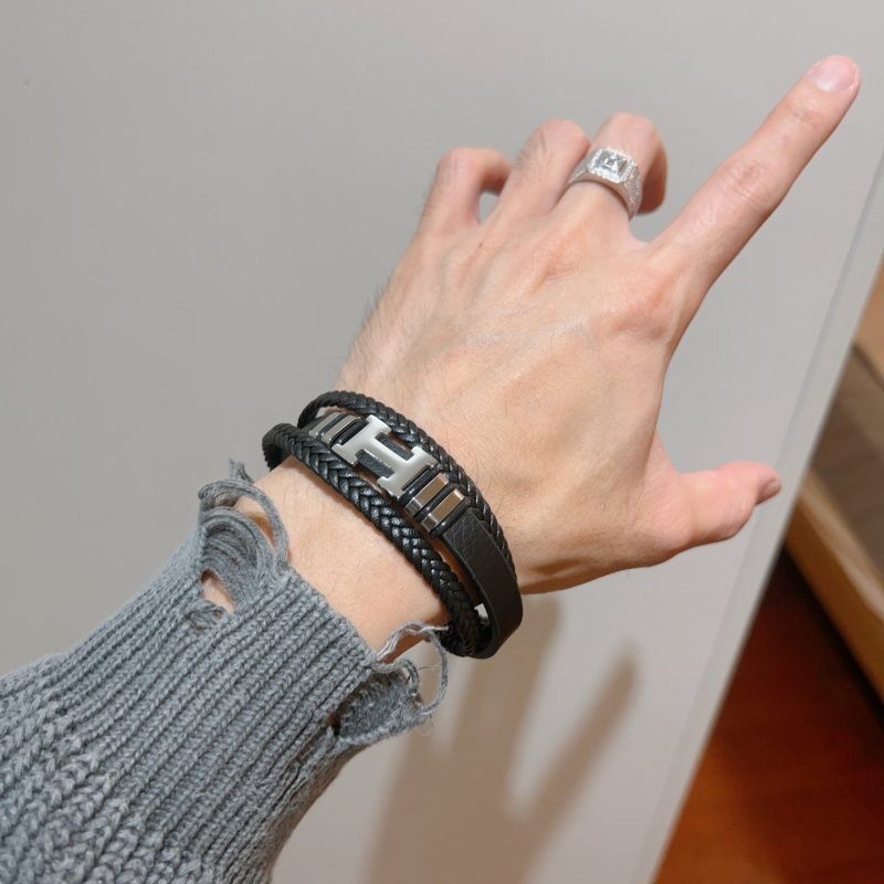 Hermes New Anger Forest H Logo Braided Leather Bracelet bracelet Black braided leather silver-tone palladium plated metal hardware 19cm