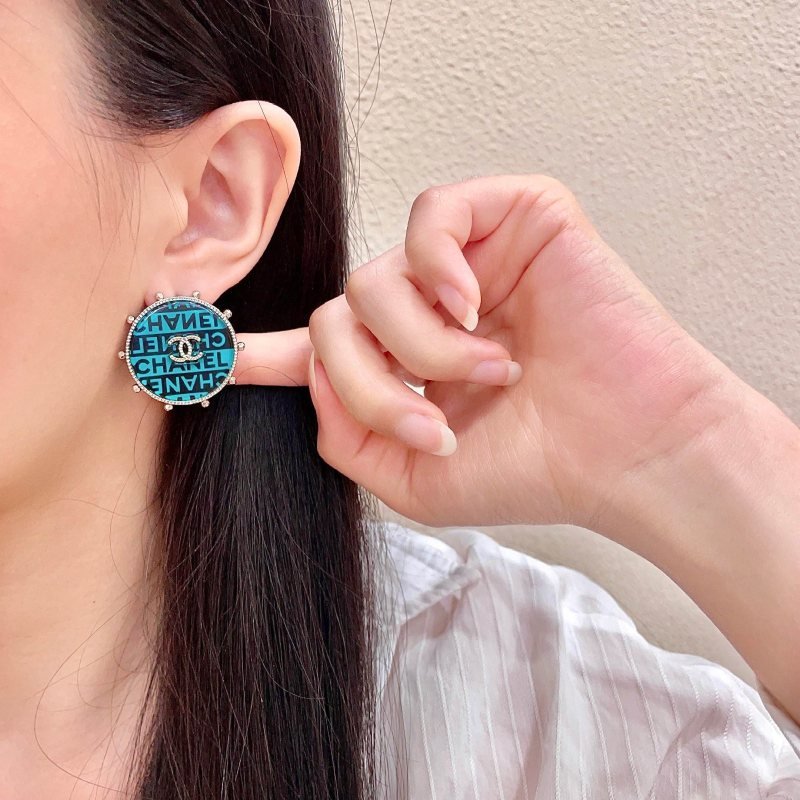 Chanel CC Logo Round Stud Earrings earrings Light gold-tone metal with turquoise and black enamel crystal-embellished interlocking CC logo 2 5cm diameter