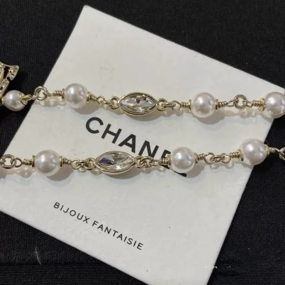 Chanel Crystal Bow CC Pearl Necklace necklace Light gold tone metal white faux pearls clear crystals 42cm with 5cm extender