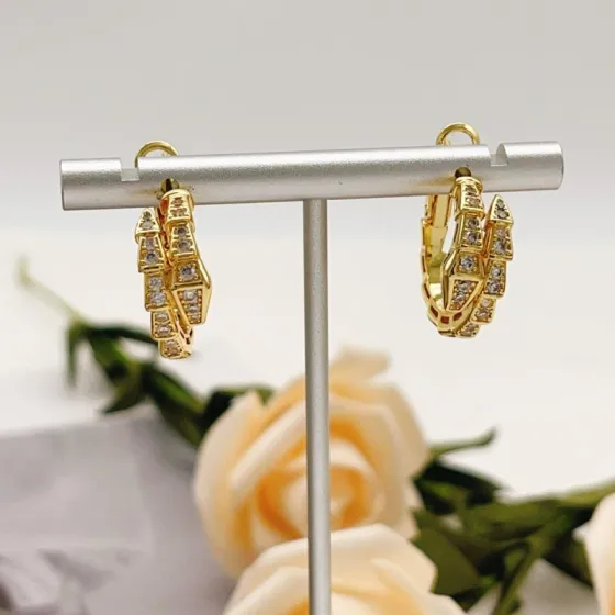 Bvlgari Serpenti Viper earrings yellow gold with clear pave diamonds 15mm outer diameter