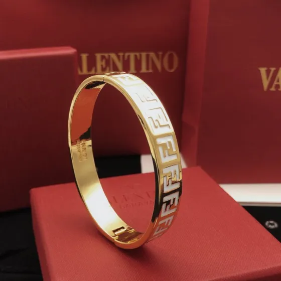 Fendi FF Logo Enamel Bangle bracelet gold-tone metal with white enamel 17cm inner circumference