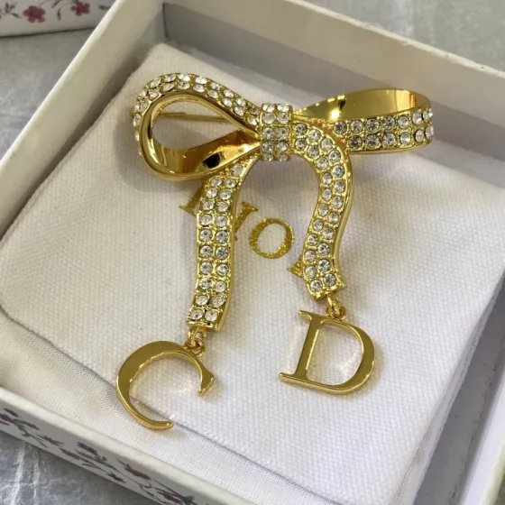 Dior Bow CD Charm Crystal Brooch brooch gold-tone metal with clear faceted crystals 4 5cm width x 5cm drop length