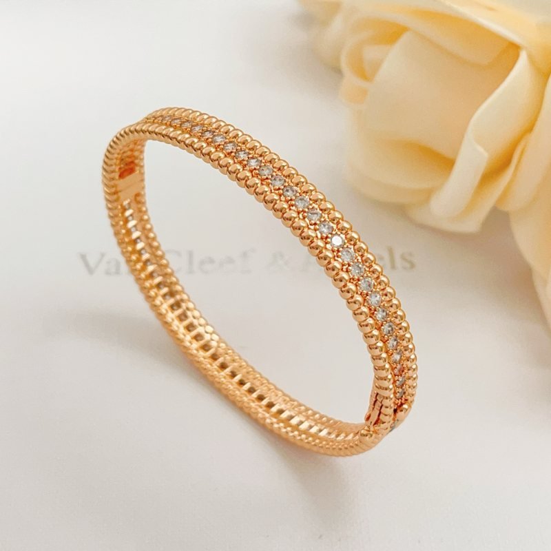 Van Cleef Arpels Perlee bracelet Rose gold metal with clear diamond accents 17cm inner circumference