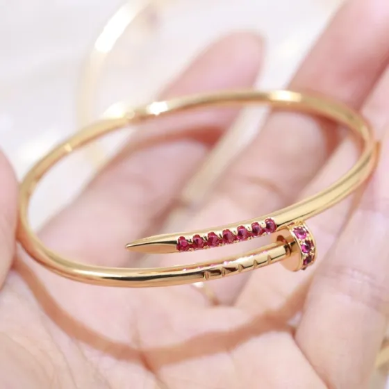 Cartier Juste un Clou bracelet 18k yellow gold ruby red gemstones 17