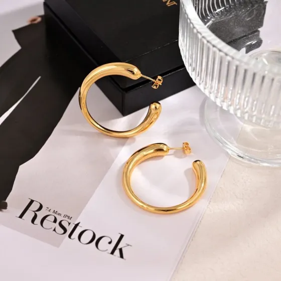 Saint Laurent 1961 Chunky Open Hoop earrings Polished gold-tone metal polished silver-tone metal no gemstones 40mm outer diameter
