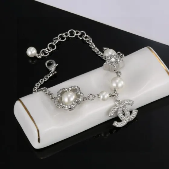 Chanel CC Logo Pearl Star Clover Charm Bracelet bracelet Silver-toned metal white faux pearls clear crystal rhinestones 18cm with 3cm extender