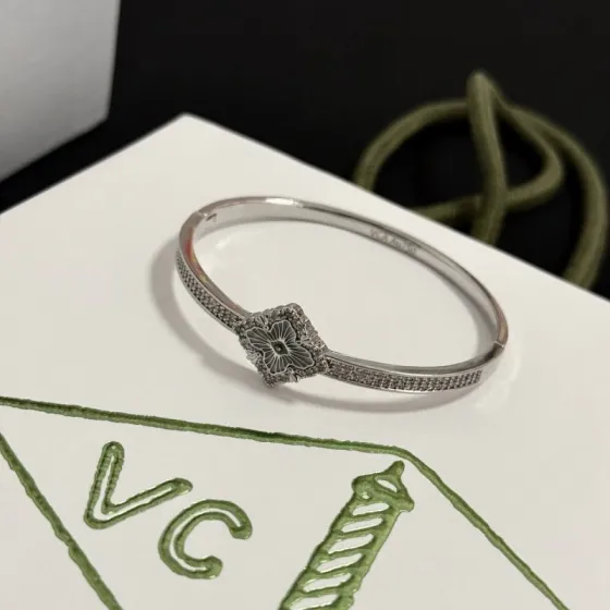 Van Cleef Arpels Alhambra bracelet silver-toned metal with clear diamond accents and rhodium-finished floral motif 17cm