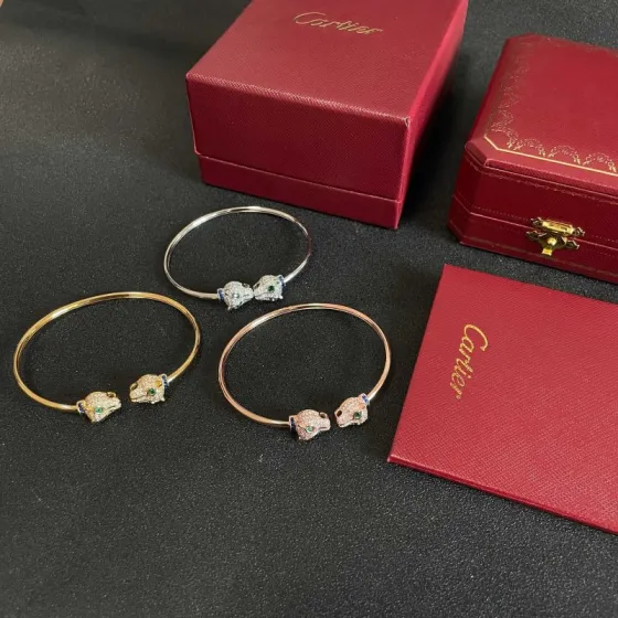 Cartier Panthere de Cartier bracelet Rose gold with pave diamonds emerald eyes blue sapphire accents 17cm