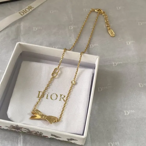 Dior Bow CD Logo Necklace necklace gold-tone metal with clear crystal accent 42cm with 5cm extender