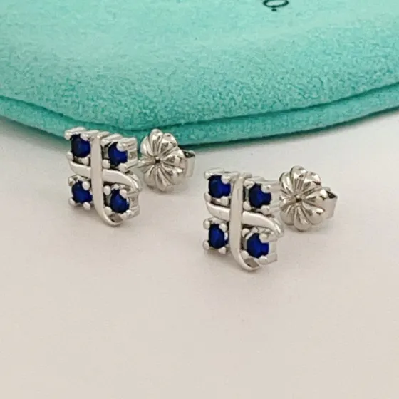 Tiffany Tiffany T earrings sterling silver with deep blue sapphire stones 8mm stud diameter
