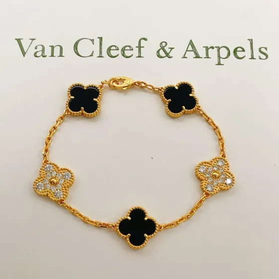 Van Cleef Arpels Vintage Alhambra bracelet Yellow gold with black onyx and clear diamond accents 18cm