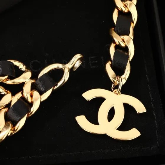 Chanel CC Logo Leather Woven Chain Belt necklace Gold-tone metal with black leather interwoven gold CC logo charms 105cm