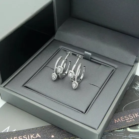 Messika Move Series earrings 18k white gold with clear diamonds 18k yellow gold with clear diamonds 1 5cm hoop diameter
