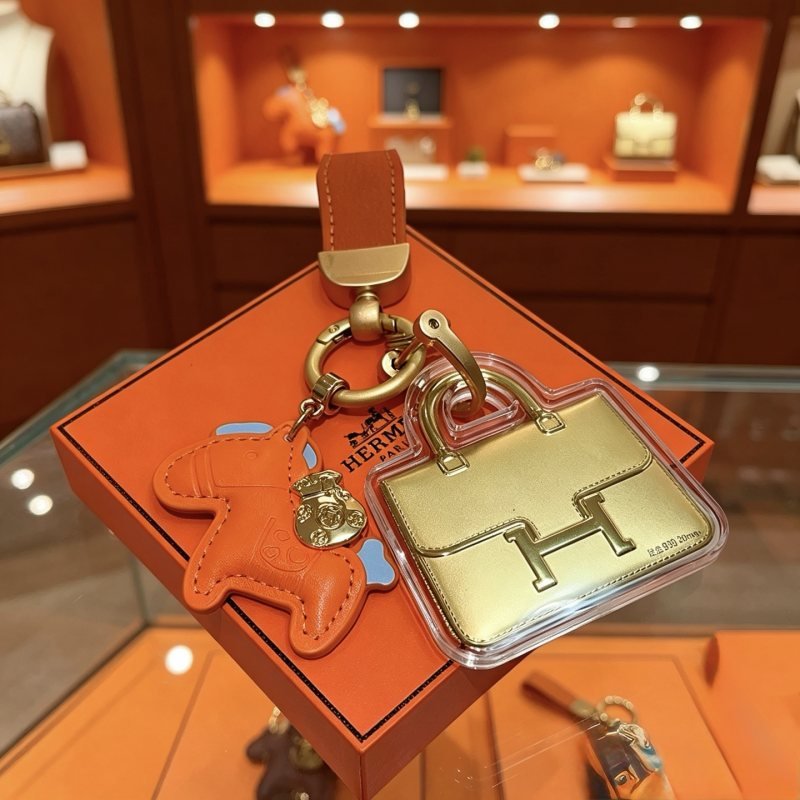 Hermes Constance Horse Bag Charm Keychain pendant Orange leather gold-tone metal light blue accent clear protective casing 12cm total length