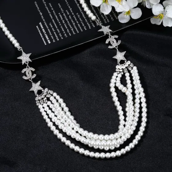 Chanel CC Logo Star Multi-Strand Pearl necklace silver-tone metal white faux pearl clear crystal 42cm with 5cm extender chain