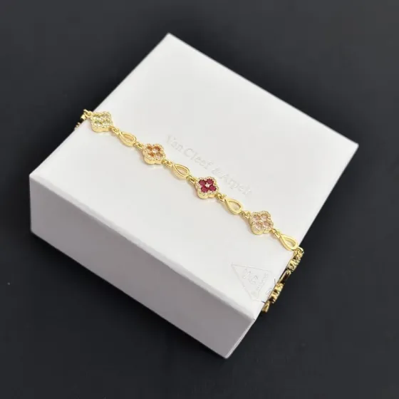 Van Cleef Arpels Alhambra bracelet Yellow gold with multicolor gemstones peridot emerald onyx amethyst pink sapphire ruby diamond accents 18cm