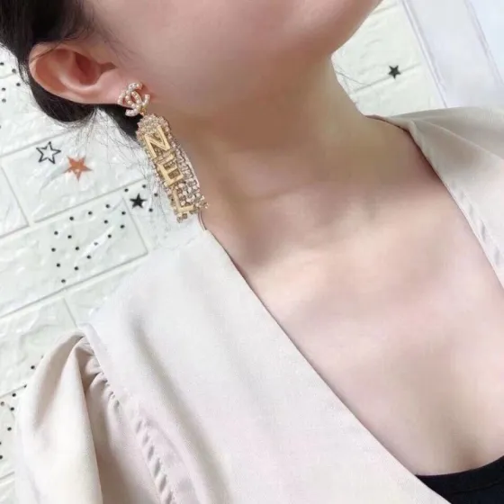 Chanel CHA-NEL Letter Crystal Fringe Drop Earrings earrings gold-tone metal white faux pearl clear crystal 6 5cm drop length