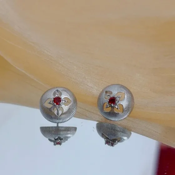 Piaget Rose earrings silver-toned white gold with red gemstone center and clear diamond accents 10mm diameter