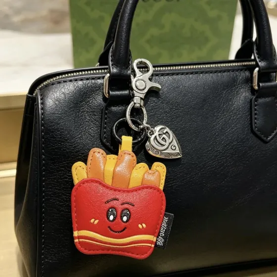 Gucci Anger Forest Cartoon French Fries Bag Charm Keychain pendant Silver-toned metal hardware red leather fries container yellow and orange leather fries black enamel facial details yellow accent stripes Total length 9cm charm height 6cm