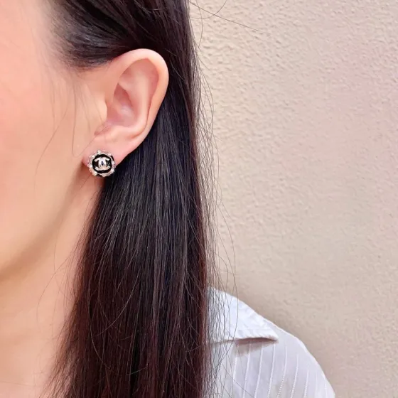 Chanel CC Logo Round Stud Earrings earrings Silver-tone metal with black enamel and silver interlocking CC logo 1cm diameter