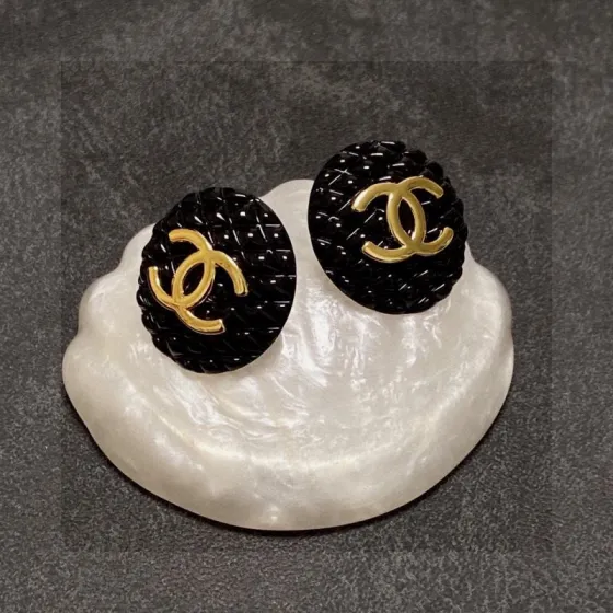 Chanel CC Quilted Round Stud Earrings earrings Gold-tone metal with black quilted resin 2 2cm diameter
