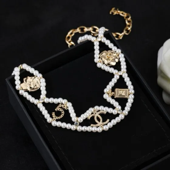 Chanel CC Logo No 5 Camellia Charm Pearl Choker necklace Gold-tone metal white faux pearl clear crystal 38cm with 5cm extender