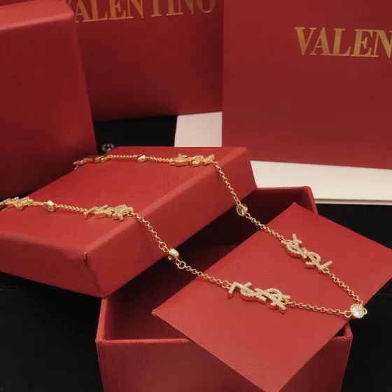 Saint Laurent YSL Monogram Multi-Logo Crystal Station Necklace necklace gold-tone metal with clear crystal accents 42cm with 5cm extender
