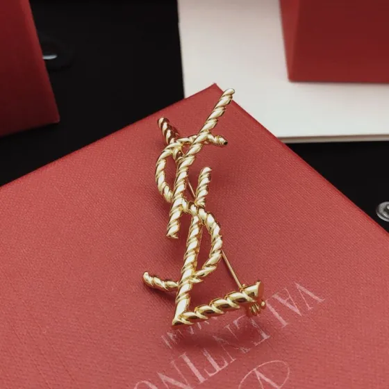 Saint Laurent Cassandre Twisted Monogram Brooch brooch gold-tone metal no gemstones 4 5cm height