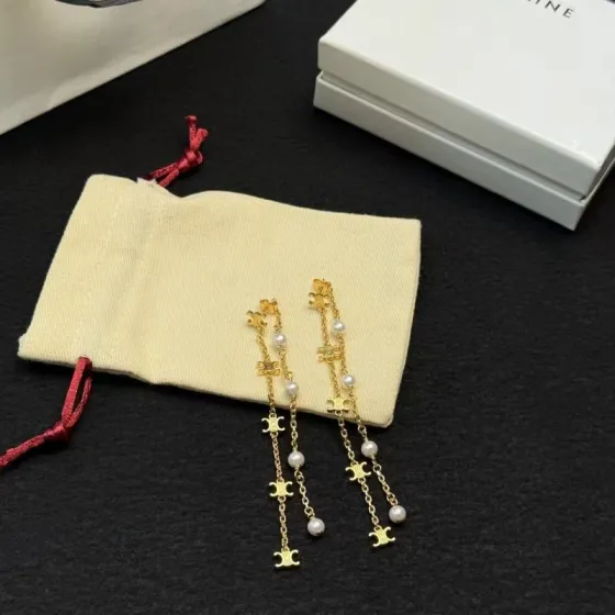 Celine Triomphe Pearl Long Chain Drop Earrings earrings Gold-tone metal with white pearl accents Approximately 7cm drop length