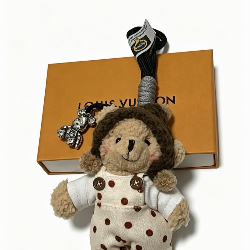 Louis Vuitton Anger Forest Bear Charm pendant silver tone metal beige plush brown knit white fabric with brown polka dots red and white knit black cord gray cord wrap 12cm total length