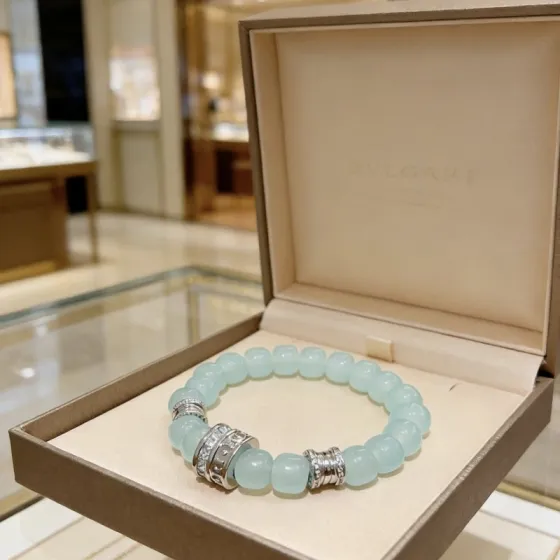 Bvlgari B zero1 bracelet Silver-toned metal with pale aqua blue beads and clear diamond accents 18cm