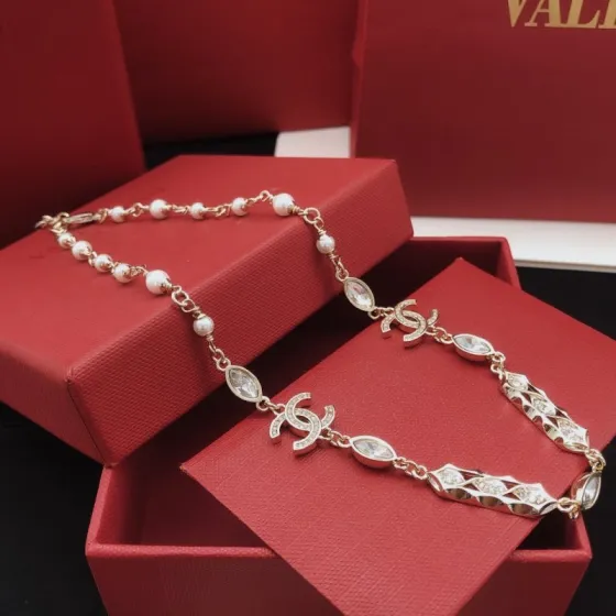 Chanel CC Logo Pearl Crystal Choker necklace gold-tone metal white faux pearl clear crystal 40cm with 5cm extender