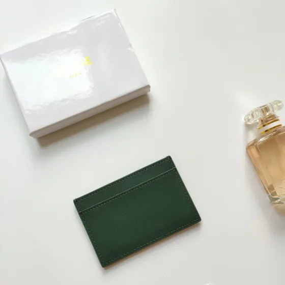 Celine Triomphe card holder dark green smooth leather no additional metal or stone accents 10 5 x 7cm
